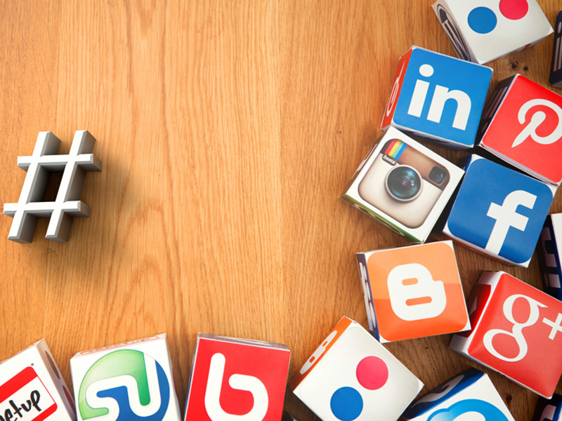 London, United Kingdom- September 24, 2013: Social media logos printed onto handmade cubes. Logos include Facebook, instagram, linkedin, blogger. Social media uses web and mobile technology to connect people